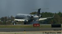 N14179 @ ORF - An Embraer, getting some smoke on landing - by Paul Perry