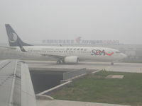 B-5119 @ PEK - A foggy day at Beijing Capital International Airport (PEK) China - by Ken Wang