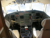 N779SG @ ORL - Falcon 900 cockpit - by Florida Metal