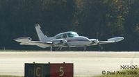 N6142C @ ORF - Cessna 310 headed for RWY 5 to hold for traffic - by Paul Perry