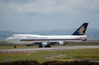 9V-SPQ @ AKL - Turning onto the runway for take-off - by Micha Lueck