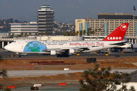 N643NW @ LAX - Northwest Cargo N643NW (FLT NWA906) exitting RWY 25R after arrival from Ted Stevens Anchorage Int'l (PANC). What a nice paint scheme! And...this airplane was originally with Flying Tigers. My father was with them from 1969-1981.