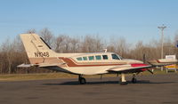 N1048 @ ANE - 1974 Cessna 402B, c/n 402B0628, Parked on the west side of Anoka County - by Timothy Aanerud