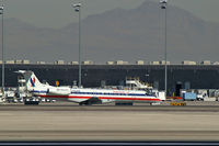 N828AE @ KLAS - American Eagle Airlines / 2002 Embraer EMB-135KL