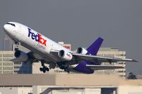 N359FE @ LAX - FedEx N359FE (FLT FDX3019) climbing out from RWY 25R enroute to Chicago O'Hare Int'l (KORD). - by Dean Heald