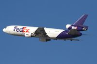 N359FE @ LAX - FedEx N359FE (FLT FDX3019) climbing out from RWY 25R enroute to Chicago O'Hare Int'l (KORD).  Note that the 'x' in FedEx on the tail is missing. - by Dean Heald
