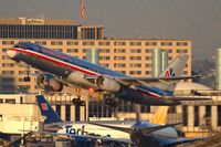 N641AA @ LAX - American Airlines N641AA (FLT AAL264) climbing out from RWY 25R enroute to Boston Logan Int'l (KBOS). - by Dean Heald