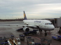 D-AILP @ ENGM - Lufthansa A319-100 at gate in Oslo, Norway - by John J. Boling