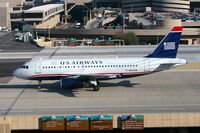 N803AW @ PHX - US Airways (America West) N803AW taxiing across the bridge to the gate after arrival on the South Complex. - by Dean Heald