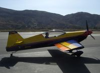 N94AX @ SZP - Howard/Vanhoy GILES G-202, Lycoming AEIO-360 180 Hp, roll rate >400 deg./sec., g rating-+/- 10 gs, taxi after landing Rwy 04 - by Doug Robertson