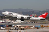 N661US @ LAX - Northwest Airlines N661US (FLT NWA1) departing RWY 25R enroute to Narita Int'l (RJAA). - by Dean Heald