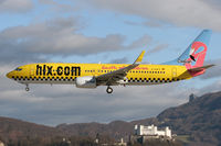 D-AHFX @ SZG - Hapag-Lloyd Express, Boeing 737-8K5(WL), at background Salzburg Castle (Hohensalzburg) - by Lötsch Andreas