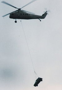 N901CH @ YIP - Sikorsky S-58 lifting a little car before dropping it at Airshow