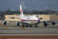9M-MPH @ LAX - Malaysia Airlines 9M-MPH taxiing through the alley after arrival on the north complex.