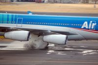 F-OLOV @ NRT - Big puddle on the taxiway - by Micha Lueck