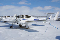 N336TS @ YXU - Parked in front of Diamond Flight Centre - by topgun3