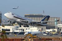 9V-SFI @ LAX - Singapore Airlines Cargo 9V-SFI (FLT SQC7889) departing RWY 25R enroute to Shanghai Pudong (ZSPD), while United Airlines N374UA (FLT UAL1163) from San Francisco Int'l (KSFO) is on final approach to RWY 24R.