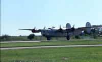 N224J @ ARR - Landing after fly by - by Glenn E. Chatfield