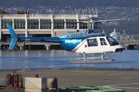 C-GZPM - Bell 206L-1 Long Ranger II taking off from Vancouver Harbour HeliJet pad. - by None
