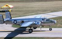 N25GL @ DPA - Taxiing by the control tower - by Glenn E. Chatfield