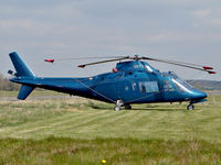 N877SW @ EGBO - Agusta A109A II - by Robert Beaver