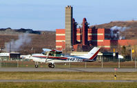 N4975G @ FRG - Skyhawk departing RWY 32 - by Stephen Amiaga