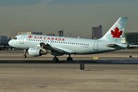 C-GAQX @ KLAS - Air Canada / 1997 Airbus A319-114 - by Brad Campbell