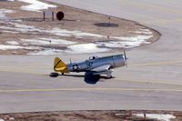 N47EM @ DPA - Little replica of a P-47 taxiing by the control tower. - by Glenn E. Chatfield