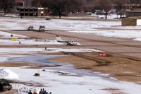 N323E @ DPA - Gear stuck in transit, landing runway 15 with fire trucks standing by.  Good job.