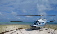 V3-AHA - Astrum Helicopters' Bell 206 Jet Ranger B3 at Glover's Reef - by Gustavo Giron Jr. - Astrum Helicopters