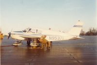 N95371 @ FBG - No longer registered.  That's me preflighting one of my early flights, with a 6-month old license, taking friends flying.  Notice the ramp; our battalion built that from M8A1. - by Glenn E. Chatfield