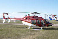 C-GMBC @ CYYC - Eagle Helicopters Bell 407 - by Yakfreak - VAP