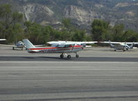 N714HH @ SZP - 1977 Cessna 150M, Continental O-200 100 Hp, landing touchdown Rwy 22 - by Doug Robertson