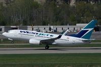 C-FGWJ @ CYLW - Westjet Boeing 737-700 - by Yakfreak - VAP