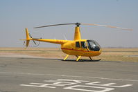 ZS-RJL @ FAGM - Robinson R44 at Rand, South Africa - by Pete Hughes