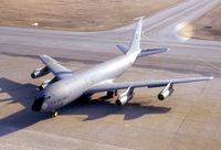 57-1463 @ CID - KC-135E parking at the base of the tower.  Film got hot, left brown haze. - by Glenn E. Chatfield