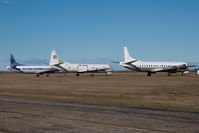 UNKNOWN @ CYQF - Air Spray Lockheed Electra - by Yakfreak - VAP