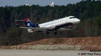 N404AW @ RDU - Veritably leaping into the air - by Paul Perry