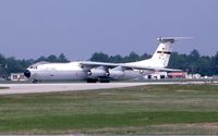 65-0261 @ POB - C-141B taking the runway for departure - by Glenn E. Chatfield