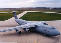 66-8306 @ CID - C-5A at the base of the control tower - by Glenn E. Chatfield