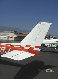 N9819J @ SZP - 1975 Cessna A150M AEROBAT, Continental O-200 100 Hp, rated +6,-3 Gs, checker stripe tail - by Doug Robertson