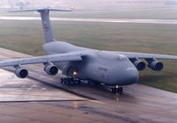 70-0449 @ CID - C-5A taxiing to the cargo ramp by the control tower - by Glenn E. Chatfield