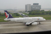 B-MAN @ ZSPD - Air Macau Airbus A319-132 leaving gate at Shanghai Pudong International - by Ken Wang