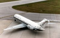 160051 @ CID - C-9B taxiing to runway 27 for departure - by Glenn E. Chatfield