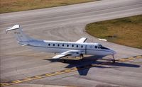 86-0079 @ CID - C-12J taxiing by the control tower - by Glenn E. Chatfield