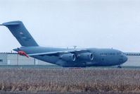 99-0064 @ CID - C-17A parked on taxiway C, 3/4 mile from photographer - by Glenn E. Chatfield