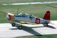 N61483 @ DPA - SNV-2, ex BT-13 44-32150, taxiing past the control tower - by Glenn E. Chatfield