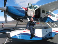 N208FM @ BGBW - A captain and his ship - N208FM on the ground in Narsarsuaq - by Brian Thompson