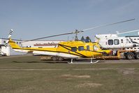 C-GEEC @ YYC - Eagle Copters Bell 212 - by Andy Graf-VAP