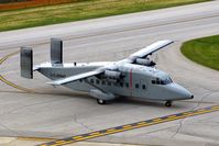 94-0311 @ CID - C-23B Sherpa taxiing past the control tower - by Glenn E. Chatfield